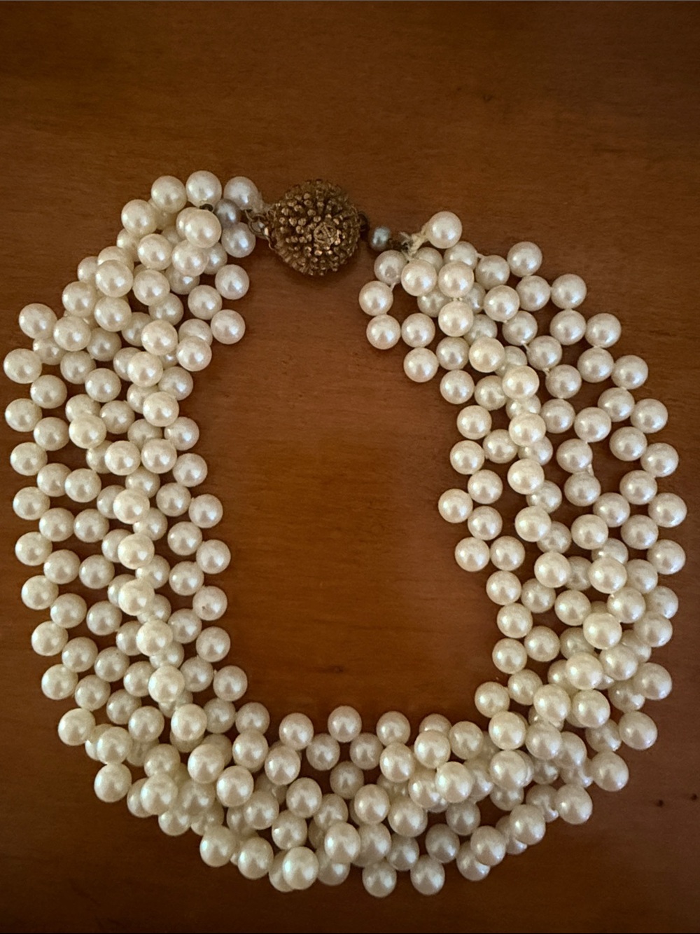 Multi-Strand Cream Pearl Necklace with Decorative Gold Clasp
